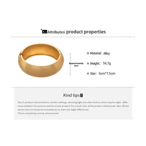 Detailed view of wide gold minimalist alloy cuff bracelet with dimensions 6cm by 7.5cm