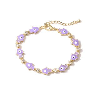 Golden Evil Eye Hamsa Hand bracelet with purple enamel and white rhinestones decoration