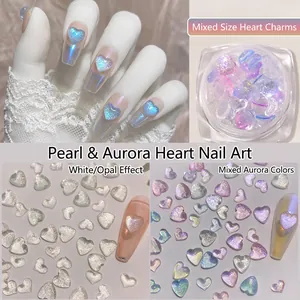 Polarized heart nail art charms with aurora pearl finish and mixed sizes in a storage box