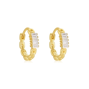Macro detail of gold plated S925 silver earring with sparkling rectangular zircon inlay