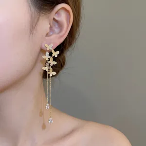 Elegant 18K gold plated butterfly tassel earrings with teardrop crystal drop charms