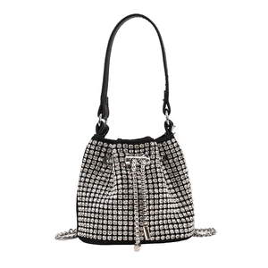 Sparkling silver rhinestone bucket bag with drawstring closure and chain strap for women