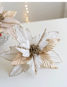 Close-up of a 27cm white velvet Christmas flower with gold glitter and sequins