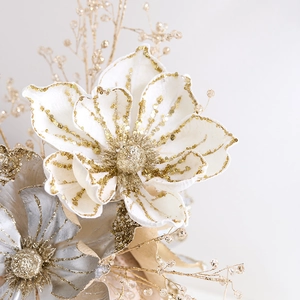 White and gold artificial Christmas magnolia flower with glittered edges and sequins decoration