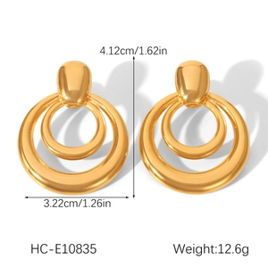 Detailed view of gold triple layered hoop earrings with dimensions and weight specs