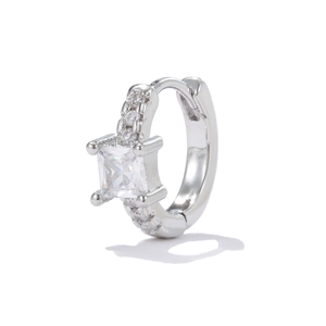 Macro view of silver hoop earring with square zircon and micro-set small diamonds