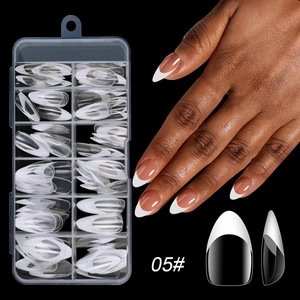Detail view of model wearing white French tip press-on nails style 05 in storage case