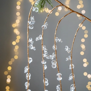 Elegant Christmas branch ornament with gold wire branches and clear crystal beads