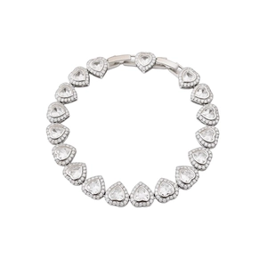 Elegant silver heart bracelet featuring heart-cut zircons and halo micro-pave setting