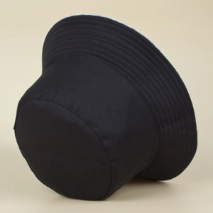 Classic plain black cotton bucket hat with reinforced brim stitching shown from a side angle