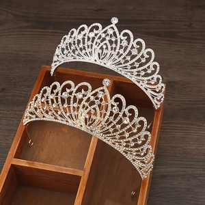 Elegant gold and silver wedding crowns with rhinestones and vintage scrolls for brides