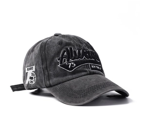 Detail of vintage washed dark gray cotton baseball cap with 3D embroidery on the side
