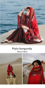 Close-up of retro red bohemian shawl with vintage geometric patterns for beach sun protection