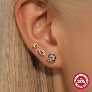S925 sterling silver evil eye stud earring set with blue zircon crystals on female ear