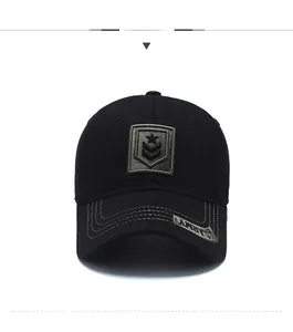 Close-up of black military baseball cap featuring army star embroidery and army woven label