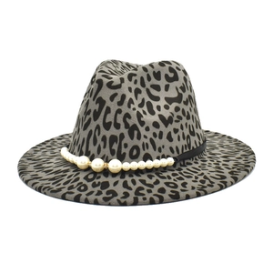 Detailed view of a fashionable grey leopard print wool felt fedora with pearl band