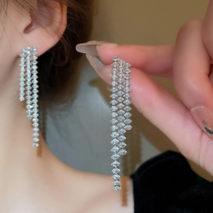 Luxury silver-plated long tassel earrings with sparkling crystals for elegant women