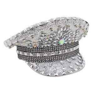 Detailed view of silver carnival captain hat with sparkling rhinestones and sequins