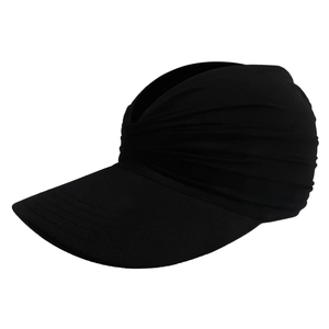 Detail view of the black pleated sun visor hat with wide brim and multilayered fabric
