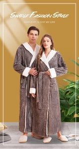 Detail of striped flannel bathrobe with white faux fur lining and plush texture