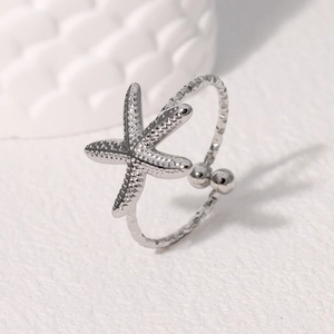 Minimalist silver starfish open ring for women with an adjustable stainless steel band