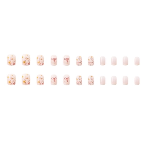 Faux ongles à presser dégradés roses avec lapins mignons, nœuds et fleurs doodle