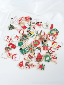 Detailed collection of colorful Christmas enamel charms including Santa, snowmen, and trees