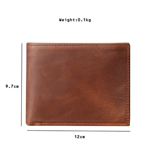Detailed view of vintage brown genuine leather bifold wallet with size and weight marks