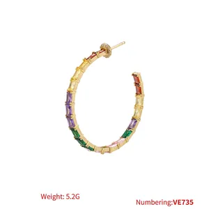 Rainbow cubic zirconia C-shape hoop earrings in gold metal base measuring 49mm