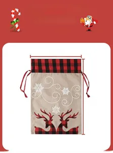 Close-up of a 37x54cm burlap Christmas gift bag with reindeer silhouettes and red drawstrings