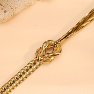 Minimalist 18K gold plated stainless steel double snake chain bracelet with knotted design