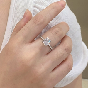 Close-up of S925 silver ring featuring a rectangular ice-cut zircon on a finger
