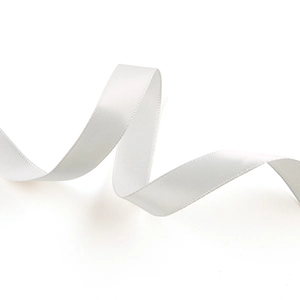 Detail of 1.5cm white double-sided satin ribbon with a smooth glossy texture in soft curls