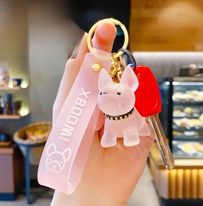 Pink crystal French Bulldog keychain with matching soft strap and golden metal ring