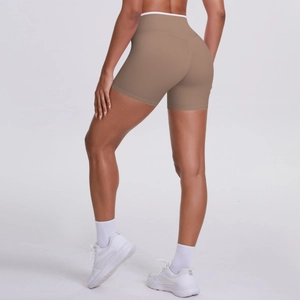 Rear view of high-waisted yoga shorts with peach lifting seam in coffee brown