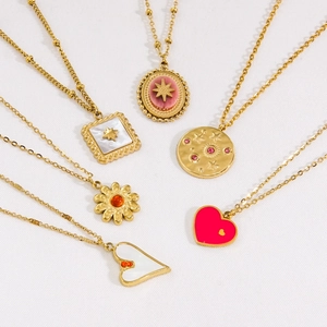 Elegant gold titanium steel necklaces featuring diverse red agate and shell pendants
