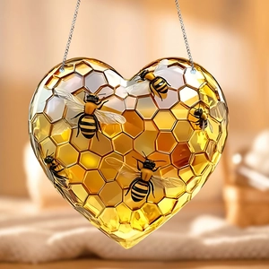 Golden acrylic heart beehive ornament with 3D bee detail and hanging chain