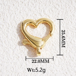 Close-up of gold-plated heart-shaped lobster clasp with dimensions 25.6mm and 22.0mm