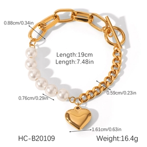 Detail view of OT clasp pearl heart bracelet with dimensional size specifications
