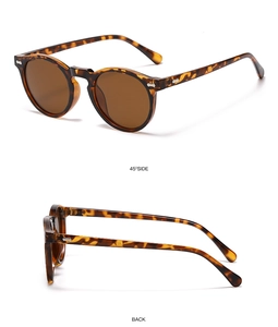 Detailansicht der runden Tortoise-Sonnenbrille mit Retro-Rahmen und braunen Gläsern