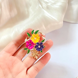 Retro enamel floral bouquet brooch with colorful poppy flowers and pearls on silk