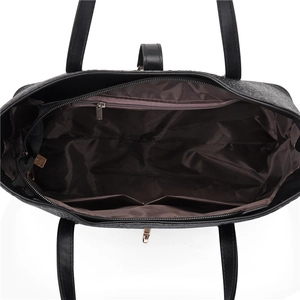 Litchi pattern black handbag showing internal compartments and zippered pocket