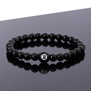Fashionable black beaded bracelet featuring a lucky number 8 billiard ball charm