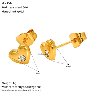 Detail of 18k gold plated 304 stainless steel heart studs with zircon stones and 7mm size