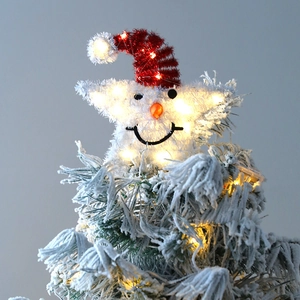 Lighted plush snowman Christmas tree topper with warm LED lights and red holiday hat