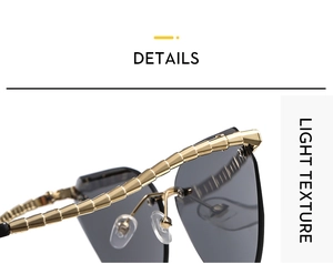 Macro detail of golden snake-scale metal temple and grey lens on cat-eye sunglasses