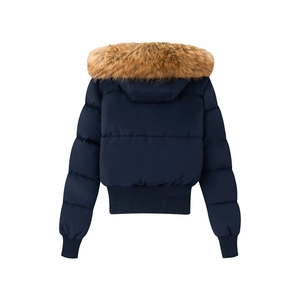 Rear view of navy blue quilted puffer jacket with fluffy brown faux fur hood