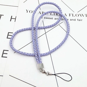 Close-up of purple braided PU leather phone lanyard with silver metal clasp