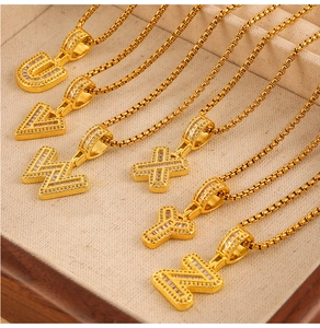 Detail of square letter pendants U to Z with sparkling zircon stones on box chains
