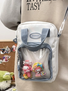 White ita bag with clear PVC window and blue straps for anime pins display